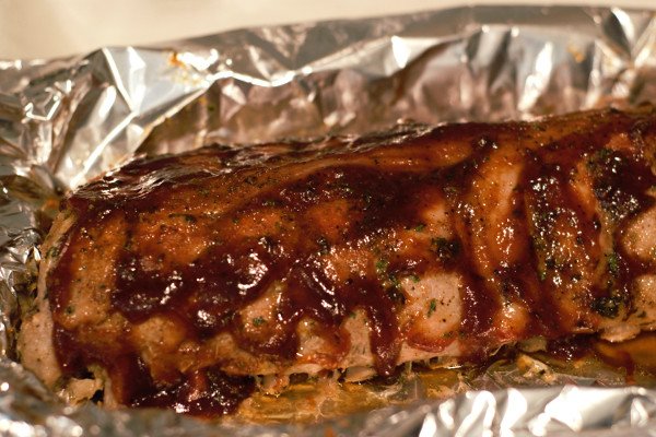 Sauce up these baby back ribs with your favorite barbecue sauce.