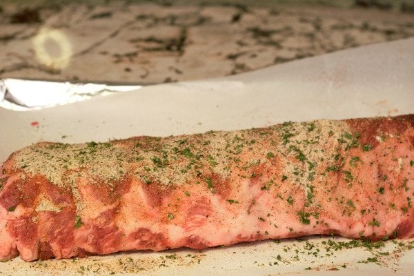 Season the ribs on both sides with dry seasoning.