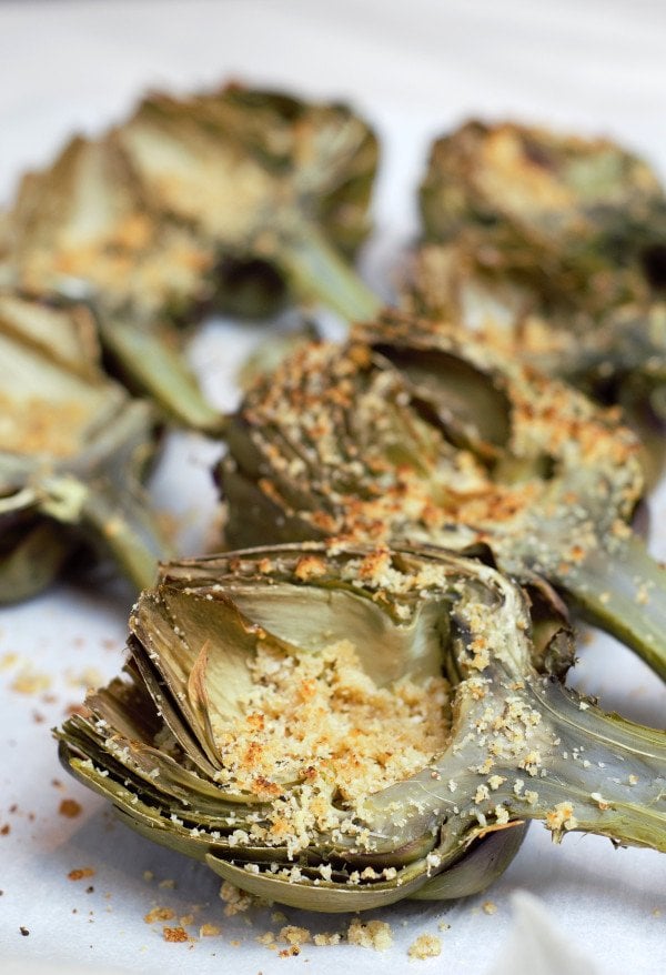 Perfectly steamed artichokes stuffed with parmesan, garlic bread crumbs finished under a low broiler for 4 minutes.