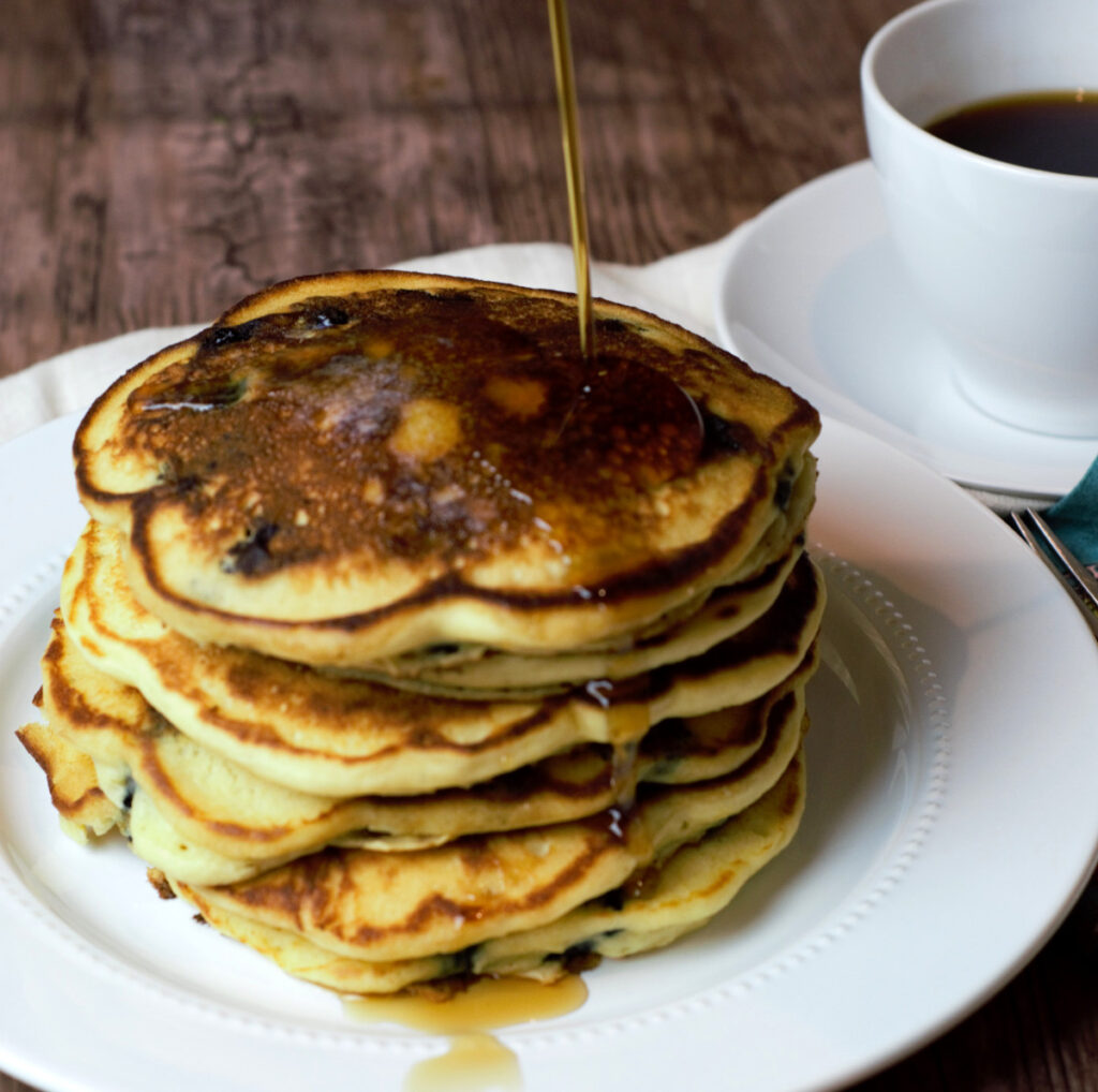 Stack of pancakes with coffee