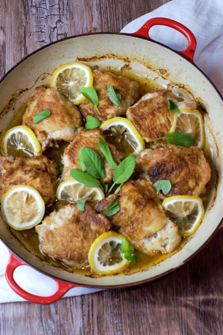 Dutch Oven Chicken Thighs with Lemon and Sage Butter Sauce Delicious