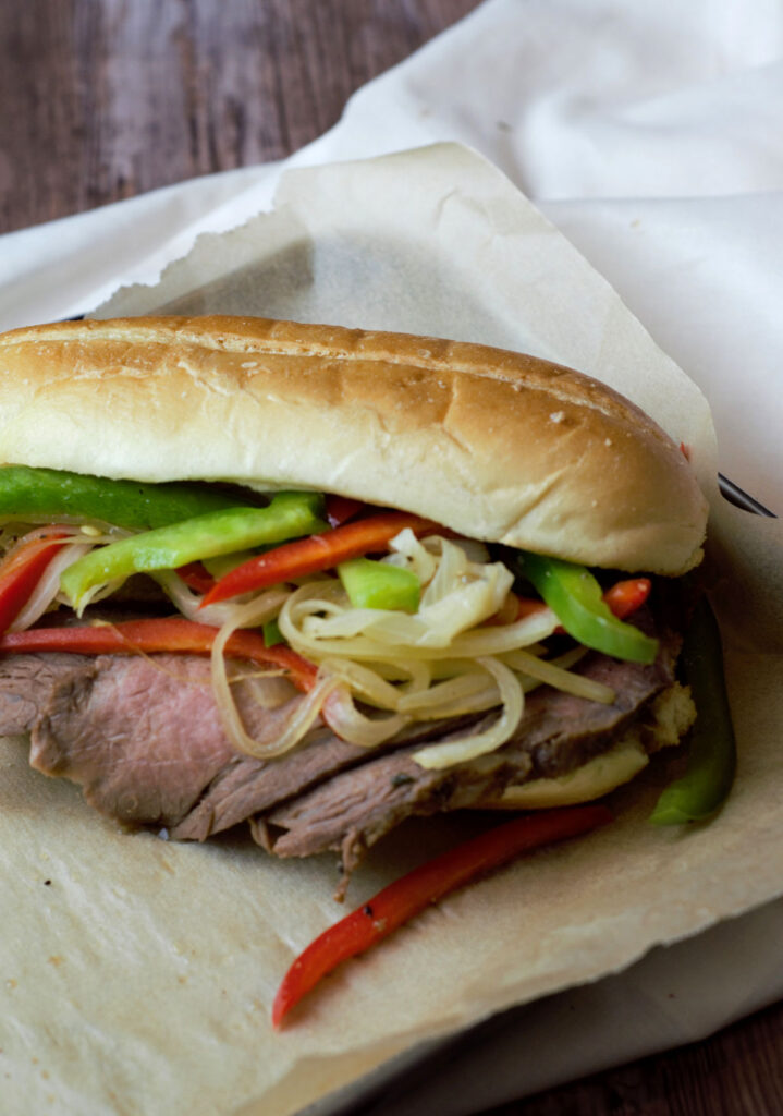TriTip Sandwich with Peppers and Onions Delicious by Design