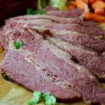 brisket sous vide slices on cutting board