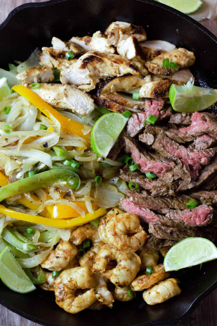 Texas Fajitas with Steak, Chicken, and Shrimp Delicious by Design
