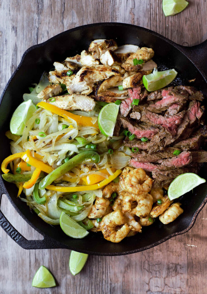 Texas Fajitas with Steak, Chicken, and Shrimp Delicious by Design