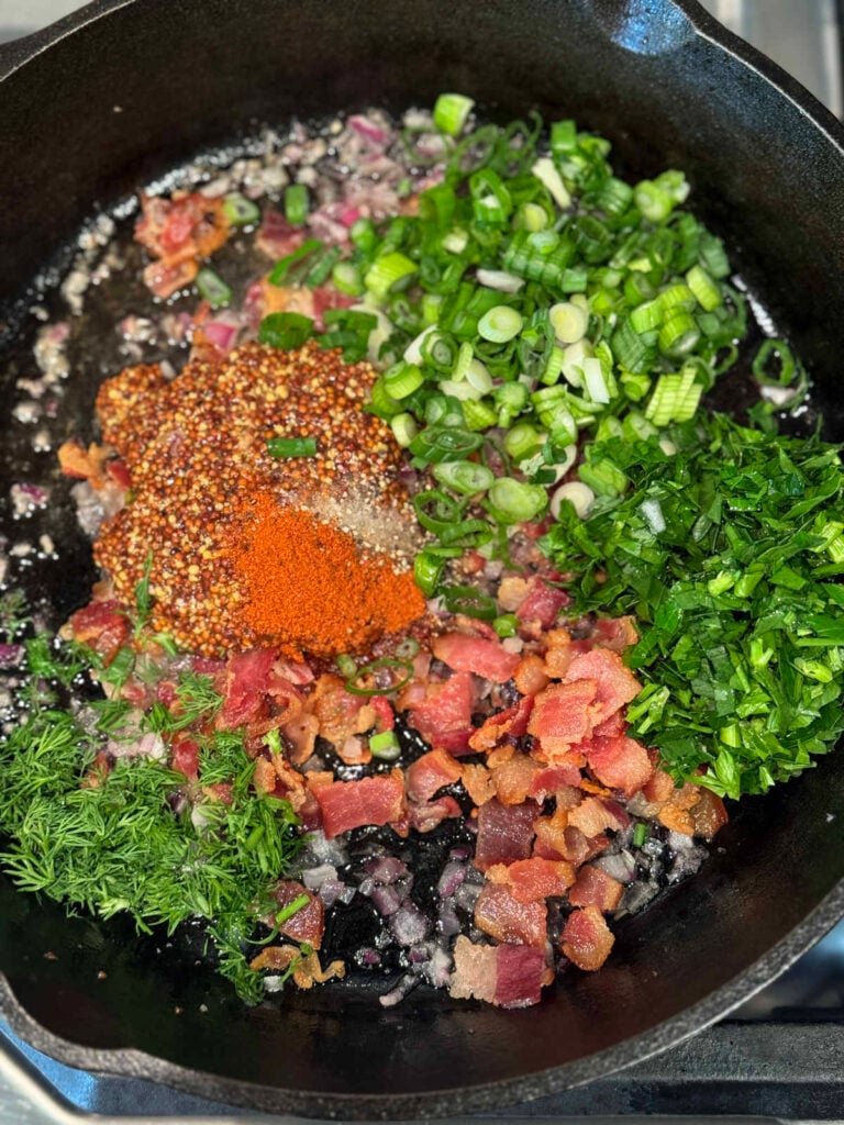 german potato salad dressing ingredients in a skillet
