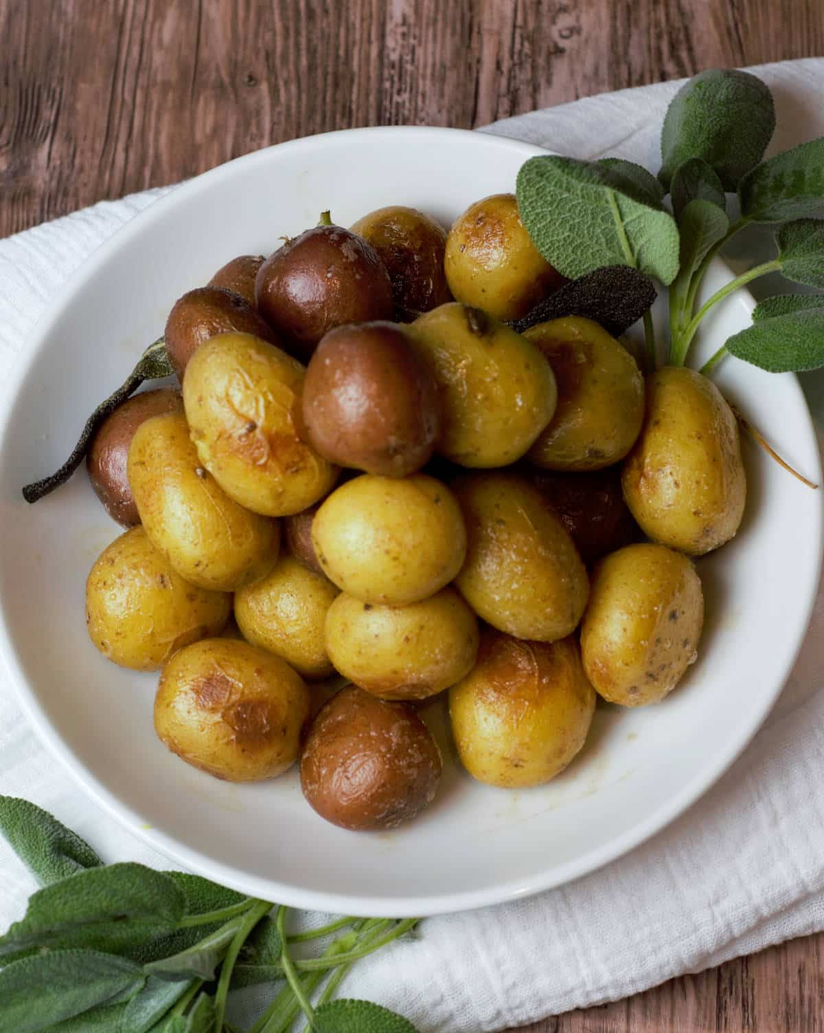 Overhead shot of potatoes in brown butter with sage