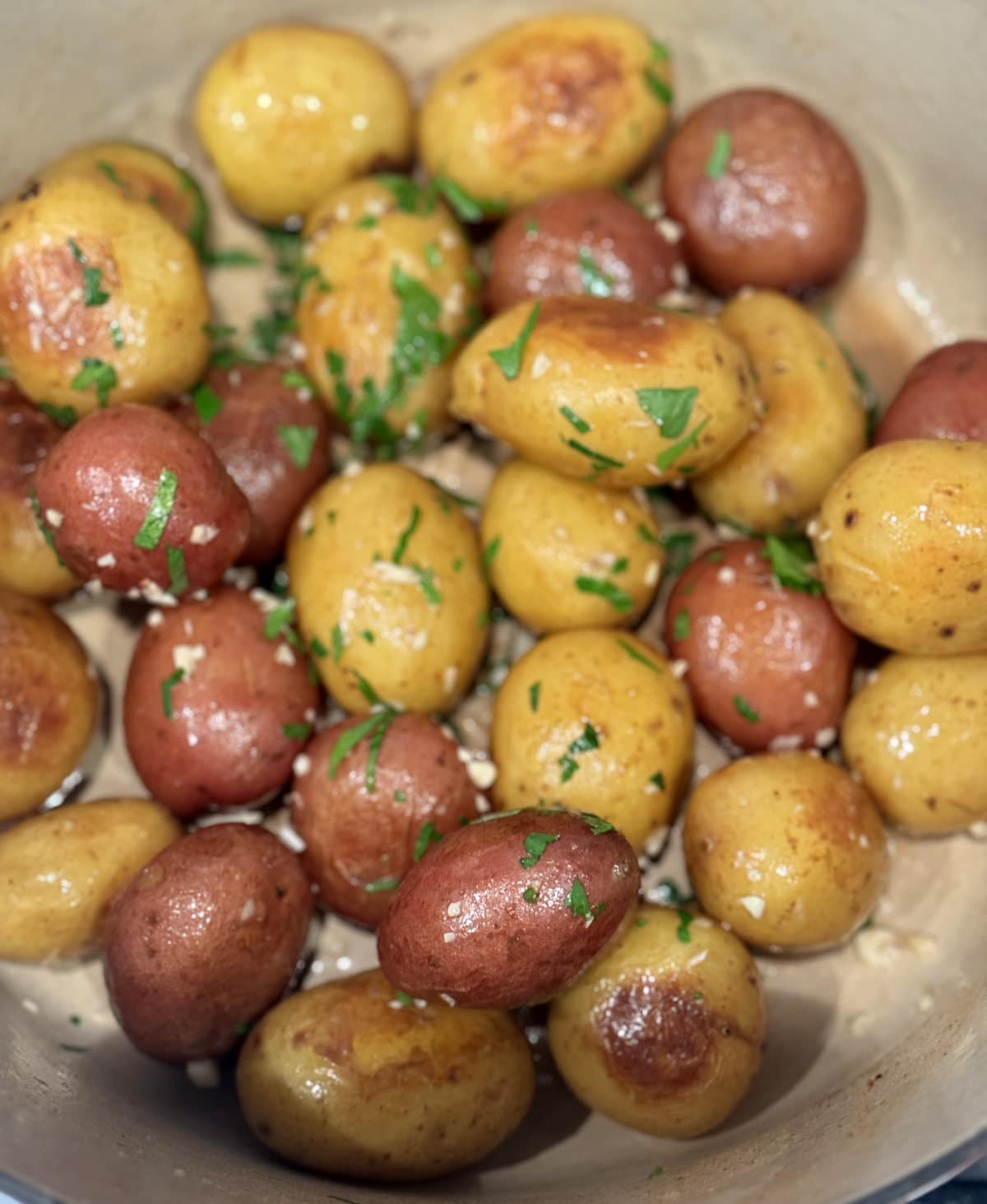 brown butter potatoes with garlic, parsley, and parmesan