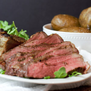 reverse sear tri tip with compound herb butter feature