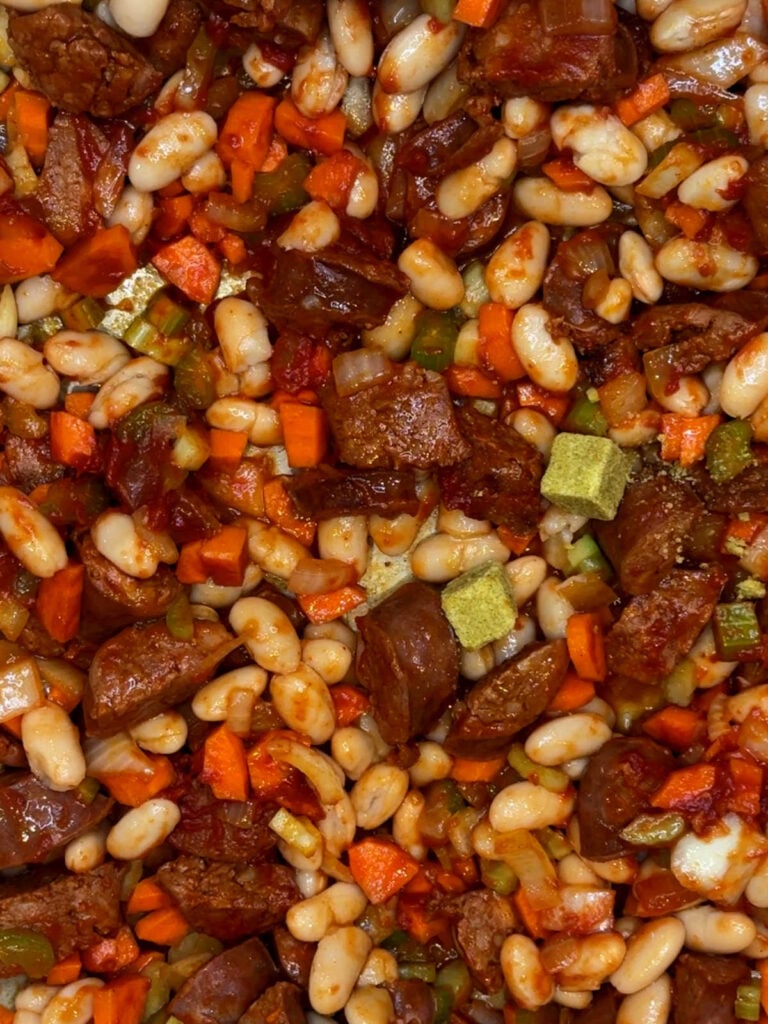 ingredients for Spanish Chorizo white bean stew in pot