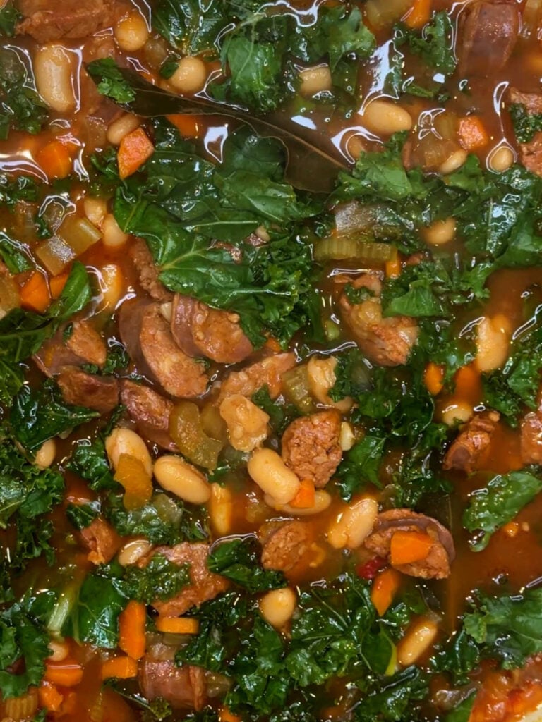 Kale added to Spanish chorizo and white bean stew